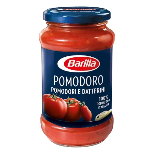 Vidro de molho de tomate com rótulo e tampa azuis